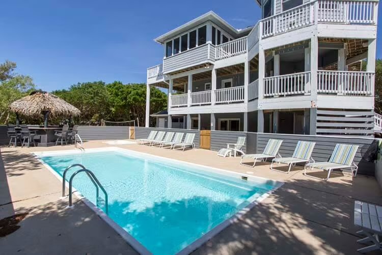Rental property pool with tiki bar