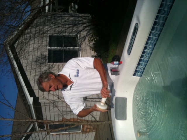 Jeff Cox servicing a spa
